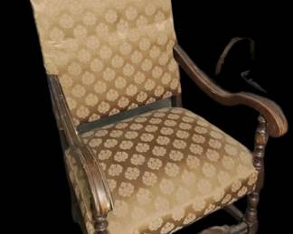 armchair with a high back and armrests