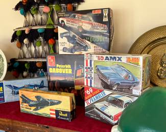 Several AMC models including AMX, Rambler and AMX sport coupe