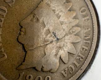 1909 INDIAN HEAD CENT WITH DIE BREAK  MINT ERROR FROM CHIN TO HEADDRESS. 