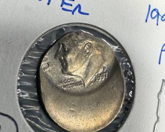 1997 ROOSEVELT DIME WITH MASSIVE OFF CENTER STRIKE. RARE COIN