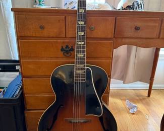 Gibson 1930s-40s guitar. Some damage in need of repair.