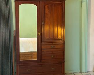 This armoire has lots and lots of storage and drawers