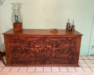 This is one you have to see to believe absolutely beautiful hand carved antique Spanish colonial lots of storage on the inside!