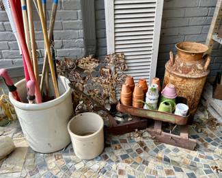 Large crocks, antique child’s sled, & antique dairy jug