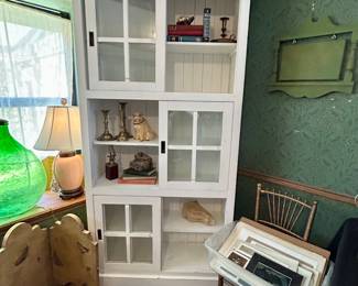 Very nice tall cabinet with sliding glass doors