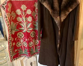 This fur-lined jacket is absolutely gorgeous -like new! 