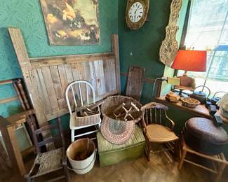 Antique paintings, a cobbler set, wooden chairs, French wall clock, bamboo stool and vintage baskets