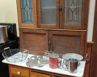 Classic vintage wooden arts and crafts hoosier cabinet with marble top