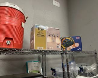 2-Light vanity fixture and a water container