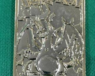 Lot # : 279z - 23k gold-plated Charizard 1999
