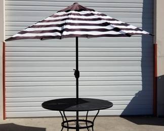 Lot # : 693 - Round patio table with umbrella and stand
