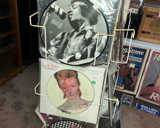 RACK FULL OF ROCK PICTURE RECORDS