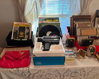 Sheet music, record albums, video camera, picture frames 