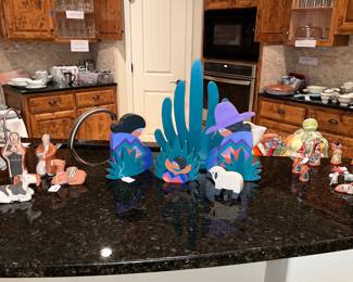 Terra-cotta nativity sets, one wooden