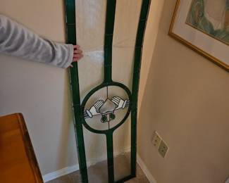 Stained glass , damaged but still looks good. 