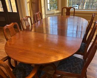 Table plus 9 chairs and 2 leafs 300.00 negotiable 