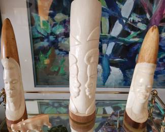 African tribal carved tusks
Carved hippopotamus & dragon