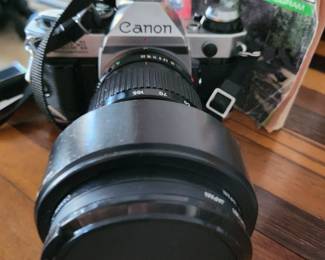 Several cameras, lenses, and misc