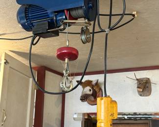 This is a very nice Cummins industrial lift hoist! In perfect working condition
