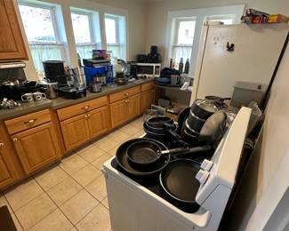 The kitchen is all displayed and ready to be viewed! A complete kitchen stocked with many high-end pieces, and everything is in like new condition!
