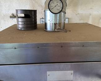 This is a massive professional grade smoker! Comes with tank and the base that is on wheels! Take a look a good look!