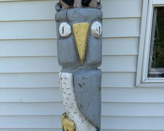 Mid level is a carved owl.