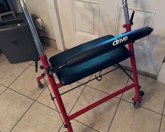 Now we’re back in the house and here we haven’t near mint Drive walker with seat. These are top-of-the-line and we have sold dozens of these over the years. They last forever.