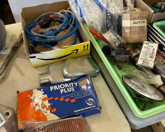 The shot is filled with many different car and motorcycle accessories, most of them brand new.