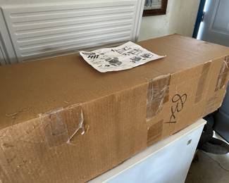 This box was a mystery as it had nothing on it. When we opened it we found out. It is a complete brand new never used set of workbench legs!