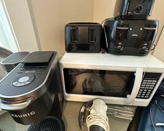 A great microwave and if you like toast, boy do we have toasters there’s three of them right there! 😉