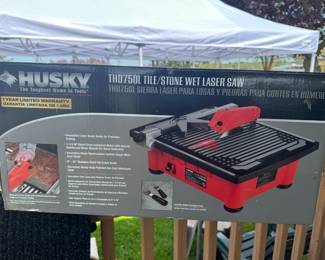 Husky THD750L Tile/Stone Wet Laser Saw! (Please note, this is the original box, but it was damaged and will not be with the actual saw.)