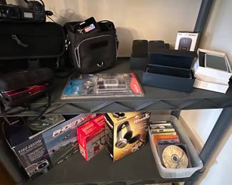 Wireless headphones in the original box of Phoenix, RC radio, controlled plane and other assorted electronics!