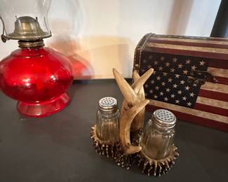 All the details have little things that catch your eye I particularly like this rustic intertwined, deer, antler salt, and pepper shaker! It’s vintage and will look great in a cottage. The red oil ain’t bad either.