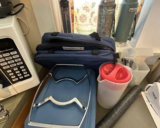 Here to great anchor hocking covered 9 x 13 glass dishes with travel cases! A couple of vintage Stanley thermoses! They are both well loved and have seen many cups of coffee!