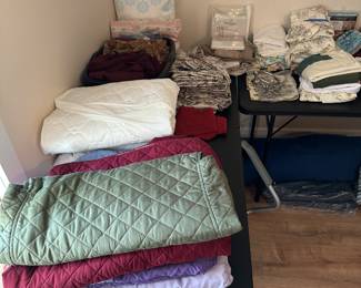 We have blankets sheets, towels, sleeping bags, rugs, you name it we have it. There is also a terrific selection of drapery.