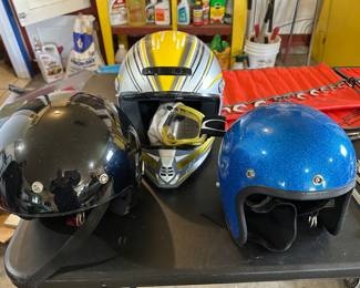 Here are three excellent helmets. They are all an excellent condition as you can see. The black one on the left is an official Harley-Davidson helmet. We actually have many official Harley Davidson pieces in this sale.