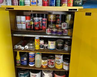 He was a solid, steel, yellow cabinet, primarily filled with paint of all types and colors and also a lot of cleaning supplies!