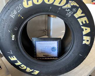 This is a very interesting piece. This is a tire from race car driver Joey Logano car number 20. It’s from the Budweiser shootout Daytona, Florida, February 6, 2010. Signed and dated by the driver.