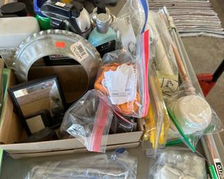 This end of the table has a lot of miscellaneous items from plumbing to gardening most of them brand new