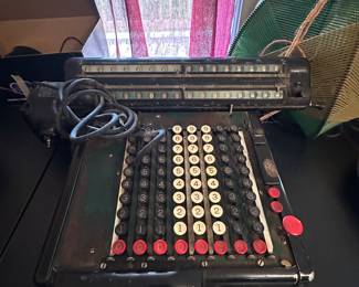 This is an excellent vintage piece. It is a vintage Monroe, adding calculator used in the early 20th century! I believe this is a model K.