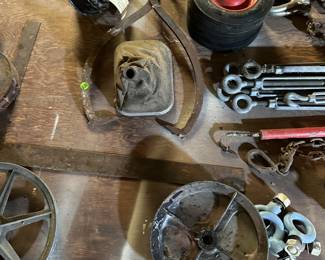 A set of wheels, some antique implements