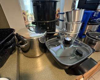 Great stock pots, several vintage enamel! At the center is an excellent Oster electric fryer that looks as if its never been used!