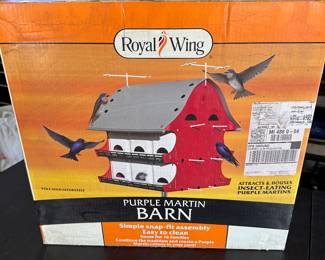 This is pretty self-explanatory. It is a royal wing purple Martin barn birdhouse. It says a design to hold up to 16 purple Martin families. Absolutely mint perfect in the unopened box.