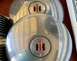 This is a pair of international harvester, cub, cadet, lawn and garden decorative hubcaps!