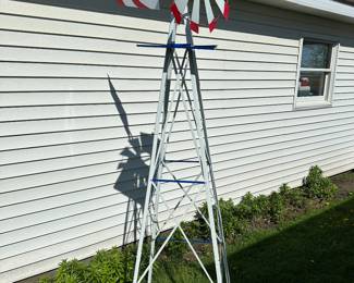 There was an earlier pic of this beautiful patriotic, windmill in the building, but now that we have it outside in the sun, it really shines! In absolutely perfect mint condition!