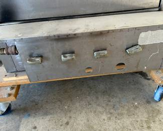 This is a massive professional grade smoker! Comes with tank and the base that is on wheels! Take a look a good look!