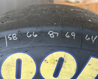 This is a very interesting piece. This is a tire from race car driver Joey Logano car number 20. It’s from the Budweiser shootout Daytona, Florida, February 6, 2010. What you see here in this picture is the signatures by the driver!