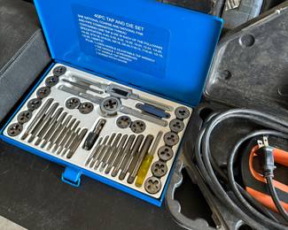 These next few shots are of a banquet table filled with Milwaukee tools and many other brands. This is a nice brand new never used tap and die set.