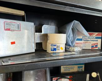 The top shelf has drywall accessories