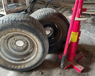 a couple of nice vintage tires on original rims and a manual tire changer